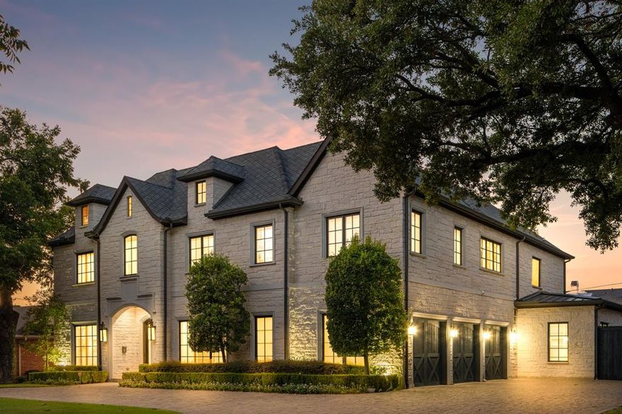 Exceptional executive home, built by Colby Craig Custom Homes and designed by renowned architect Richard Drummond Davis. Great drive-up appeal. PERFECT flow for entertaining. This fabulous architect is known for the clean-lined simplicity and open plan concepts of contemporary architecture composing elegant, dramatic facades.This charming French Austin stone Transitional is located on large 100 x 188 lot in the Fairway of Prime Preston Hollow. A meticulous build with attention to luxury details. The beautiful finishout is obvious throughout. 5 bedrooms all with ensuite baths. Media room currently used as gym, an elevator, 3 car garage, huge covered patio with fireplace & outdoor kitchen. Primary bedroom complete with fireplace and amazing expansive closet. Primary luxury spa bath has heated floors. No carpeting.
FIRST FLOOR: Large primary bedroom suite with HUGE 21 X 18 closet, Library-Study, Amazing Chef’s kitchen, Wet Bar, Formal Dining & Living, Mud & Utility room. The Great Room has fabulous views of the back yard with its outdoor living area & kitchen. All of the first floor & the patio are equipped with a sound system and speakers.
SECOND FLOOR: Large SECONDARY primary bedroom plus 3 other ensuite bedrooms, Game Room and Media Room used as Home Gym.  A second laundry room is also upstairs. A staircase leads to a large floored attic for easy maintenace of equipments.
Awesome oversized 3 car Garage. Home is located near high end Shopping, fabulous Restaurants, Tollway, Central Expwy, Love Field & DFW airports - and of course near many highly ranked private Schools.