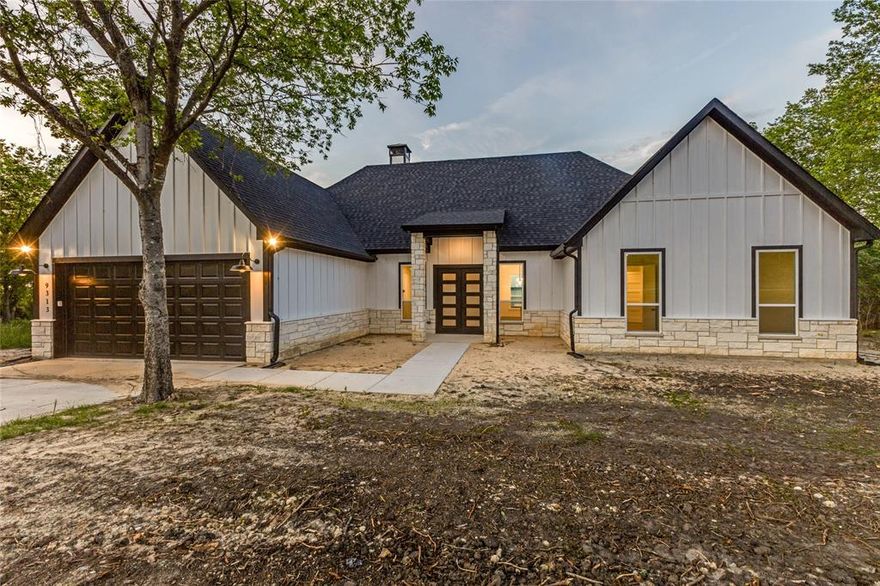 Stunning Custom builder new construction lakefront home set on a full one-acre lot and never lived in. This modern 4-bedroom, 3.5-bath home features an open-concept design, high-end finishes  and windows throughout the home overlooking the lake. A versatile multi-use room offers the flexibility for an media room, playroom or bunk area and can be closed off from the main living area for added privacy. Two bedrooms, including the primary suite, offer beautiful lake views. The open kitchen and large island flows seamlessly into the main living area for perfect entertaining. Enjoy relaxing in the living room with breathtaking lake views, where natural light pours in to create a peaceful, serene setting perfect for unwinding or entertaining. In the winter months, cozy up by the fire while taking in the tranquil views. This peaceful waterfront living on a full acre has endless potential to create your dream outdoor space. Buyers will consider $10k concessions for irrigation and sod.