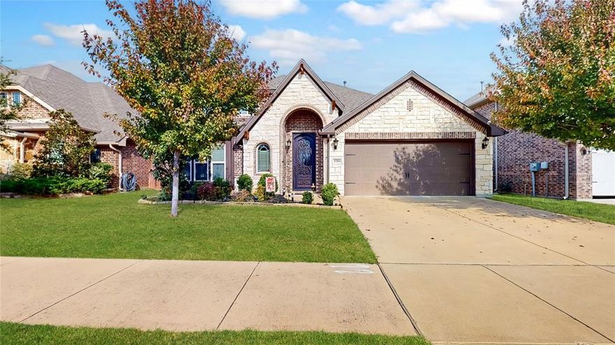 Gorgeous 2-story in Country Lakes on a premium lot overlooking one of many community ponds. Solar Panels PAID OFF by Seller! Located just a couple of blocks away from community green space and walking trails! A beautiful iron front door, brick and stone elevation, and mature trees highlight the drive up appeal of this home! Inside you will find 4 bedrooms, 3 full baths, dedicated study with French doors, upstairs loft, and 2-car garage! Upgrades and amenities include gorgeous wood-look tiling throughout main living areas, open concept kitchen and living layout, split secondary bedrooms for added privacy, an abundance of natural lighting throughout, new roof 2024, and MORE! Gourmet kitchen boasts a large island with breakfast bar and pendant lighting, stainless appliances including a gas range, dining area with coffee bar and built-ins, and walk-in pantry. Primary retreat with large sitting area offers a luxurious en-suite bath with a dual sink vanity, garden tub with separate shower, and a walk-in closets. Two secondary bedrooms on the first floor share a full hall bath. Rounding out the second level is a large game room and one secondary bedroom with a third full bath. Incredible backyard overlooking the community pond is complete with an expansive patio area and outdoor kitchen with grill and pizza oven!