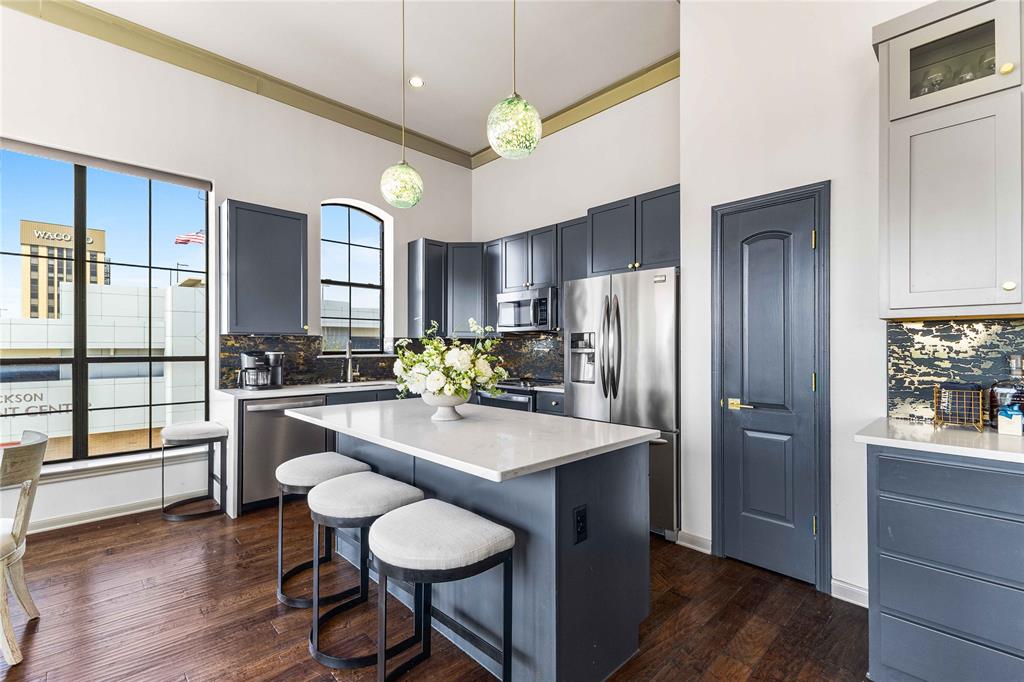 CONDO THE BALCONIES: DOWNTOWN CONDOMINIUMS, - Residential