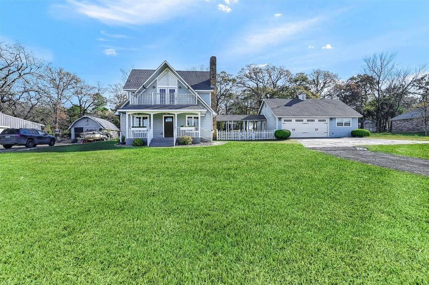 Situated on an expansive and highly sought-after double lot, this beautifully reimagined and freshly painted home seamlessly blends timeless charm with modern convenience. Just a short walk from the East Beach, playground, tennis and basketball courts, this prime location offers both recreation and relaxation at your doorstep. This 4-bedroom, 3-bath residence boasts a thoughtfully designed open-concept main level, perfect for entertaining. Upstairs, the private owner’s retreat offers a spacious sanctuary complete with a personal balcony overlooking the lake, an oversized walk-in closet, and a spa-inspired en-suite featuring a double vanity, walk-in shower, and elegant clawfoot tub. The heart of the home—the gourmet kitchen—features sleek granite countertops, high-end stainless steel appliances, a charming farmhouse sink, and custom cabinetry, creating an inviting space for culinary creativity. The detached garage includes a flexible loft area with a full bath, ideal for a guest suite, home gym, office, or creative studio. This home is move-in ready and designed for year-round enjoyment.