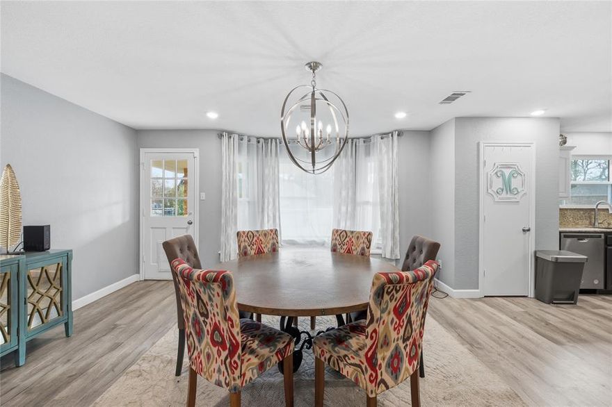 Ready for its next owner, this beautifully updated home is priced to move and the seller is prepared to consider all reasonable offers. Located in the desirable Enchanted Oaks community within Eustace ISD, residents enjoy access to community pool, playground, dog park, boat launch, and convenient boat storage—all just minutes from local shopping and dining. Situated on three lots, the property offers added space and opportunity to make it your own, complete with a new fence and an irrigation system supplied by a private water well (non-potable). Inside, you’ll find a bright open-concept layout highlighted by a vaulted living room ceiling and a striking full masonry fireplace. Recent upgrades include luxury vinyl plank flooring, fresh interior paint, updated bathroom vanities, and new gutters. The oversized two-car garage easily accommodates a full-size truck and features a bonus A-C-equipped storage shop with double doors—ideal for a golf cart, tools, or hobby space. Seller has and will convey matching new faucets for showers & tub.  Some images may have color enhanced for grass and trees. Water well is for irrigation only. Information deemed reliable but not guaranteed; buyer and buyer’s agent to verify all details.