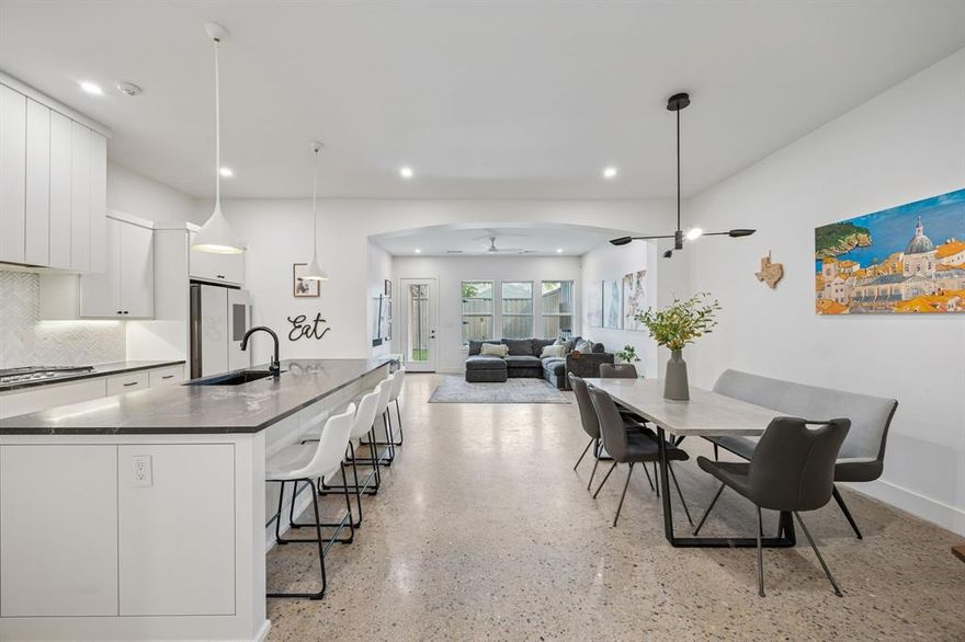 No HOA! Fabulous transitional design by Fairmont Homes, ideally situated in the heart of Oak Lawn and close to everything Dallas has to offer. This exceptional single-family attached residence stands apart with unmatched craftsmanship and meticulous attention to detail throughout its 3 bedrooms, 3.1 baths, and 2,465 square feet of thoughtfully designed living space.

Guests are welcomed through a private courtyard and striking steel front door, setting the tone for the refined interiors beyond. Inside, enjoy smooth-finish walls, elegant transitional archways, polished concrete floors, and hardwoods, all enhanced by a light, bright palette and sophisticated high-end finishes.

Upstairs, the impressive primary suite offers a true retreat with a spa-like bath featuring a double shower and an expansive walk-in closet. Secondary bedrooms are equally well-appointed, each with en-suite baths and walk-in closets.

Outdoor living is just as inviting, with a covered patio, fully turfed backyard, and a private dog run—perfect for entertaining or everyday enjoyment. Located minutes from the best of Dallas, this home truly has it all.