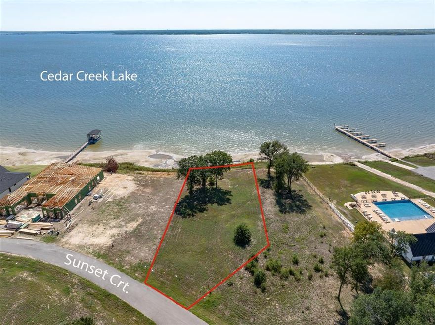 Come build in this private, gated community on this waterfront lot located within walking distance to the multi-million dollar clubhouse and huge infinity edge pool. Community dock available for use. Platted at 0.58 approximate acres this lot was one of the most sought after lots when community was first developed. Bring your plans and lets get you building.