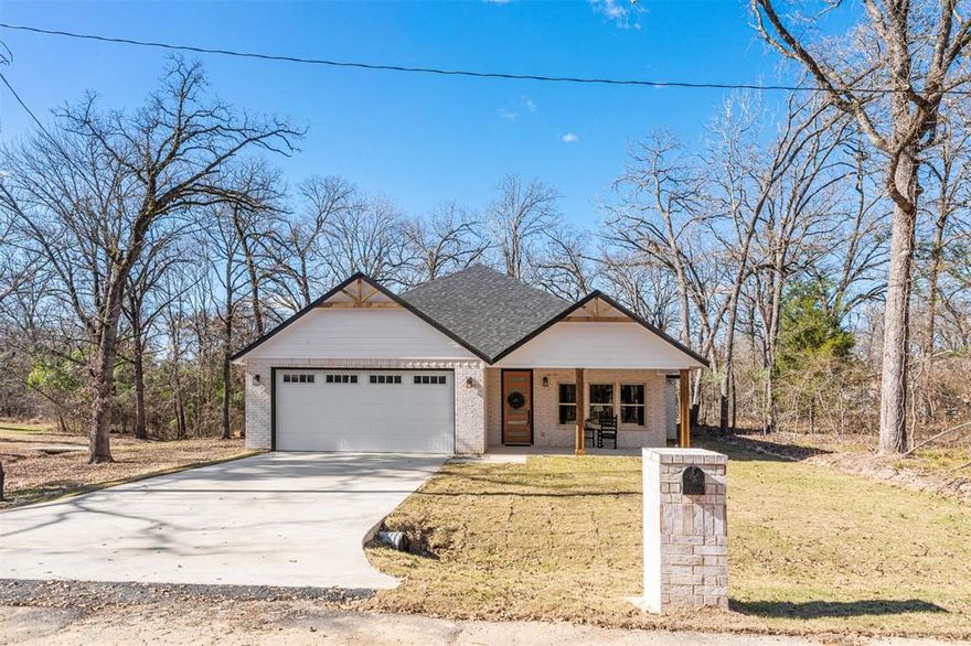 Discover modern lake-area living in this brand-new 2025 build located in a gated waterfront community in Trinidad. This 3-bedroom, 2-bath home offers approximately 1,500 sq ft with an open floor plan that centers around a stylish kitchen island, creating the perfect space for cooking, gathering, and entertaining. Contemporary finishes, abundant natural light, and a bright, airy layout make the home feel inviting and functional. Enjoy the peace of a private, HOA-maintained neighborhood with lake access and secure entry. Whether you're looking for a primary residence, vacation home, or investment property, this new construction delivers the low-maintenance lifestyle buyers want near Cedar Creek Lake.