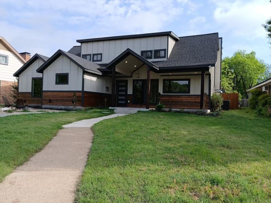 Beautifully renovated, this 5-bedroom, 3.5-bath home offers modern living with a functional layout and high-end finishes throughout. The main level features a spacious master suite with a luxurious ensuite bath, while the second floor includes a guest master suite, three additional bedrooms, and a large bonus room — perfect for a home office, media space, or play area. Major system upgrades include a new HVAC system, tankless water heater, and fully replaced electrical and plumbing. The open-concept kitchen flows into bright living areas with custom cabinetry, updated flooring, and fresh paint throughout. Energy-efficient windows, new doors, custom walk-in showers, and expanded landscaping enhance both comfort and curb appeal. Enjoy outdoor living on the covered front and back patios. Located in an established neighborhood with convenient access to shopping, dining, and major highways. Full list of upgrades available in the transaction desk.