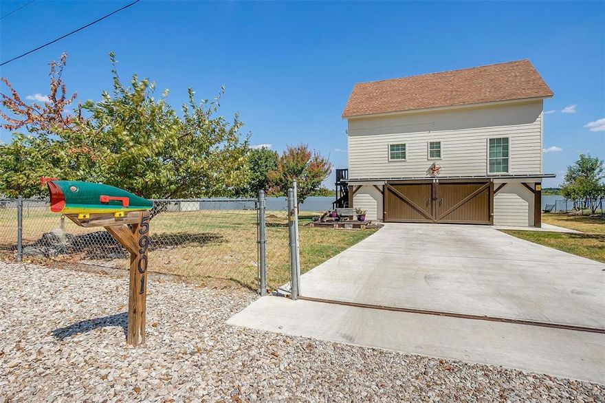 SOLICE & SERENITY awaits you... Wake up to gentle waves and endless blue skies at this stunning, modern, & classic coastal-inspired elevated lakefront home PERFECTLY situated at the end of a private Cul-de-sac. Imagine quiet mornings on the water, afternoon boat rides right from your backyard, or simply relaxing under the Texas sun with breathtaking views that NEVER get old. This BEAUTY offers 3 Accessible levels: a Top floor which includes 3 bedrooms, Utility closet, and a loft; a Second level which includes an Updated Kitchen with NEW Granite countertops, New Tile flooring throughout entire level, New Microwave, New Dishwasher, utility room for washer & dryer, and a private den; Lastly, the Primary Level which opens up on 2 sides with sliding barn doors for added privacy or an ever-flowing breeze, which makes PERFECT as a covered patio deck with a built in Safe room or utility Closet. Whether you're retiring in style, seeking a peaceful vacation getaway, embracing an active lakeside lifestyle, or looking for a turn-key Air B&B Favorite as an investor-- this property delivers privacy, space, and that coveted on the water feeling every single day!!! Modern, move-in ready, and positioned perfectly for the best breezes and views that can't be beat; Your next chapter of relaxed, waterfront living starts here. Schedule your private tour today, this one won't last long!!!