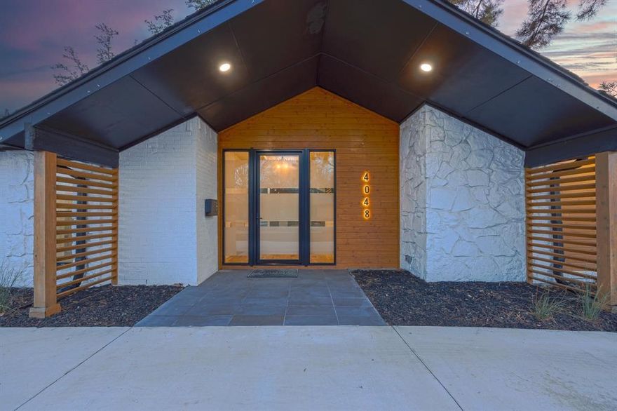 LOCATION, LOCATION, LOCATION — PRIVATE SCHOOL CORRIDOR!

Stunning mid-century home, completely remodeled into a modern masterpiece. From the moment you step inside, you’re welcomed by expansive glass doors and a light-filled foyer that opens into an elegant living space. The show-stopping floor-to-ceiling tiled fireplace anchors the room, while large windows flood the home with natural light and offer beautiful views of the backyard pool.

Designed with both style and functionality in mind, the kitchen overlooks the backyard—keeping you connected to every gathering on the patio. This home was truly made for entertaining.

The primary suite is thoughtfully positioned on the opposite side of the home, offering added privacy. It features a spacious walk-in closet ready to be customized to your needs.

Enjoy generously sized secondary bedrooms, a cozy family room with its own fireplace, and a separate living area with expansive windows that enhance the home’s bright, open feel. Step outside to a large backyard complete with a swimming pool—perfect for relaxing or hosting.

The home currently has a lease in place through April 2027. Showings will be approved with executed offer and proof of funds. At closing, the buyer will receive a credit for the full remaining rent due under the lease term, as well as the deposit, so there will be no responsibility for collecting future rent payments.