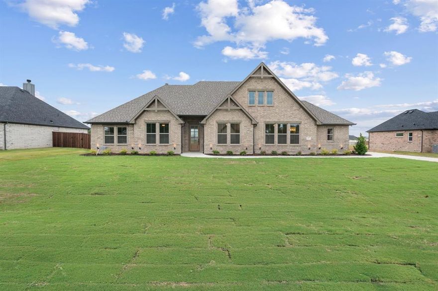 TITLE PAID FOR WHEN PREFERED LENDER USED! This beautifully designed home is currently completed and in the highly sought-after Windmill Ridge Estates (Lot 45) in charming Paradise, Texas. Featuring a spacious open-concept floor plan, this home welcomes you with a grand foyer that leads into the expansive living, dining, and kitchen areas. Offering ample space, the home includes four generous bedrooms plus an office for added versatility. The master suite is a true retreat with a luxurious bath, including double vanities, large tub, a separate shower, and an enormous walk-in closet. Enjoy seamless indoor-outdoor living with a covered patio perfect for entertaining.