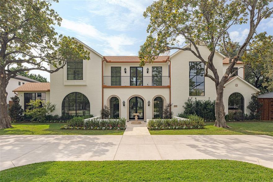 Experience refined living at its best in this 5-bedroom, 5.5-bath, 6,117 sf New Construction transitional European residence in the heart of Preston Hollow. Perfectly blending French architecture and Mediterranean warmth, this home captures timeless elegance while delivering a truly modern luxury lifestyle.

From the light brick façade and steep rooflines to the arched windows framed in black steel, every element exudes sophistication and balance. A central balcony with wrought-iron detail and lush planter boxes nods to classic European charm, while interiors showcase soaring ceilings, abundant natural light, and an effortless flow between formal and casual spaces.

The chef’s kitchen anchors the home with designer finishes and seamless connection to living and dining areas—perfect for entertaining. Outside, a hotel-inspired pool and lounge terrace create a private oasis worthy of a five-star retreat.

Located just minutes from St. Mark’s, Hockaday, and ESD, and only a quick drive to Whole Foods, this address defines convenience and prestige.

Every detail, from curated exterior materials to the harmony of tradition and innovation, makes 5938 Williamstown a rare find among luxury homes in Dallas—a residence where timeless design meets modern sophistication.