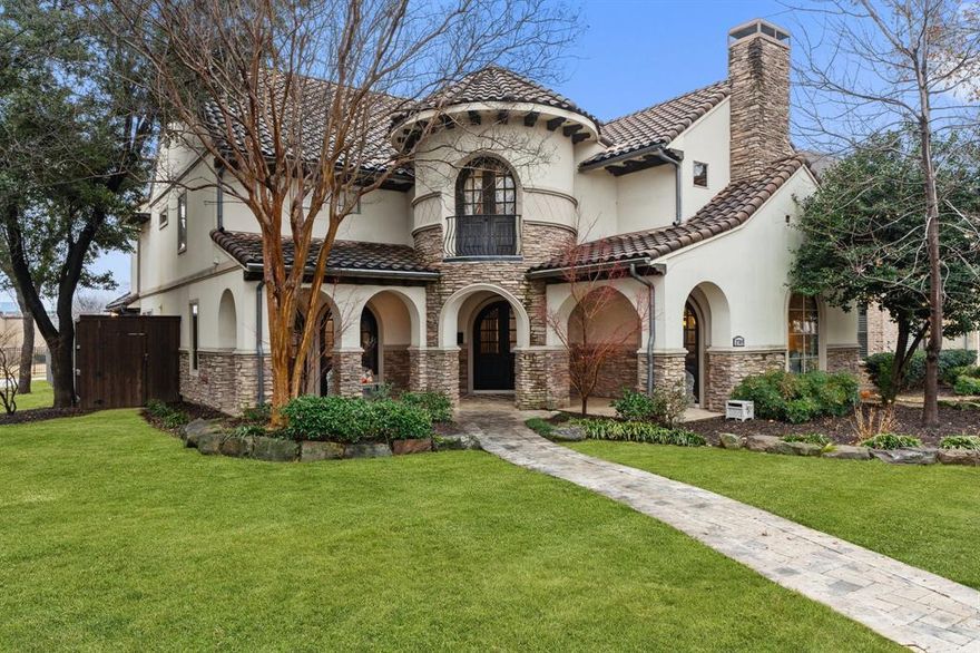 Experience the elegance of this stunning Spanish-style home, where timeless architecture meets modern luxury. With its distinctive tile roof, grand archways, and exquisite designer finishes, this home is truly one of a kind. From the moment you step inside, you’ll be captivated by the inviting open layout, rich wood flooring, and meticulous attention to detail. The updated gourmet kitchen is a chef’s dream, featuring granite countertops, top-of-the-line Viking appliances, and an oversized pantry. Just off the kitchen, a charming coffee bar provides the perfect spot to start your morning or unwind with an evening espresso. Entertaining is effortless with a built-in wet bar, ice maker, built-in beverage cooler and wine chiller. This home offers an abundance of space for work, play, and relaxation. A separate game room, dedicated media room, and private workout room provide endless opportunities for entertainment and wellness, ensuring everyone has their own retreat. Storage is never an issue with built-in cabinetry throughout, including an oversized mudroom with custom built-ins.  Additional storage is integrated into the home’s design, making everyday living effortless. The lavish primary suite is a true sanctuary, featuring a spa-like ensuite bathroom with a soaking tub, walk-in shower, and dual vanities, as well as a phenomenal walk-in closet with custom built-ins. Spacious secondary bedrooms provide comfort and privacy for family and guests alike. Step outside to your private backyard oasis, where a resort-style pool and spa await. The large covered patio, complete with a cozy outdoor fireplace, is perfect for al fresco dining. A dedicated dog run with lush turf ensures even your furry friends have their own space. Designed for comfort and efficiency, this home features a solar barrier and enhanced insulation. Nestled next to a picturesque park, this exceptional home blends Spanish charm with modern elegance. Come see it for yourself—you won’t want to leave!