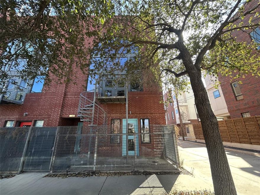 This inviting condo provides practical living with convenient features. The multi-level layout includes functional spaces designed for everyday comfort and ease. This distinctive end unit features two bedrooms and two and a half bathrooms with an urban industrial aesthetic. Expansive picture windows flood the space with abundant natural light, while exposed ductwork and concrete floors create contemporary character. A newly installed HVAC system ensures optimal comfort. The industrial kitchen showcases stainless steel appliances, stainless steel counters, and updated cabinetry for a sleek, functional workspace. The first-floor bedroom includes a private entrance and full bathroom, offering versatile living options. Upstairs, the primary suite features a custom closet for exceptional organization. The rooftop terrace provides stunning views of downtown Fort Worth's skyline, creating an ideal outdoor retreat. Located within easy reach of the city's vibrant dining and entertainment scene, this property offers convenient access to local bars and restaurants for urban lifestyle enthusiasts. Contact us today to arrange a viewing and discover how this well-maintained townhouse could become your new home in this convenient and welcoming community. This is a Fannie Mae HomePath property. First Time Buyers, complete the HomePath Ready Buyer homeownership course on Homepath.com. Attach certificate to offer up to 3% closing cost assistance.  Check HomePath.com for more details.  Restrictions apply.