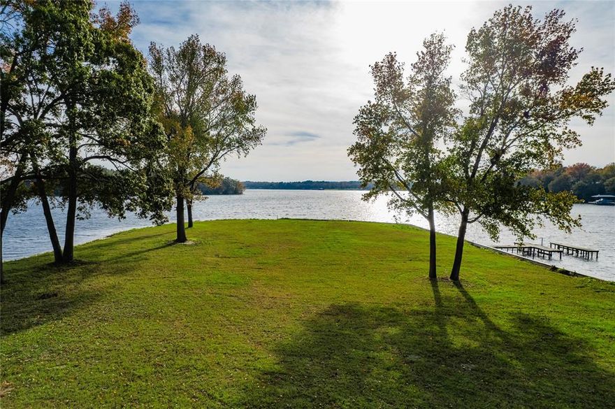 Rare Opportunity : Prime Waterfront Peninsula on Lake Athens. Discover an extraordinary 1.28 acre (including property below the 440) building site on the serene shores of Lake Athens. This exceptional peninsula boasts approximately 600 ft of shoreline and a desirable southwest exposure, offering the perfect canvas for your dream home. An existing structure on the property provides a comfortable place to stay while you plan and build your custom residence. Dont miss this chance to own one of the most coveted waterfront parcels on Lake Athens.