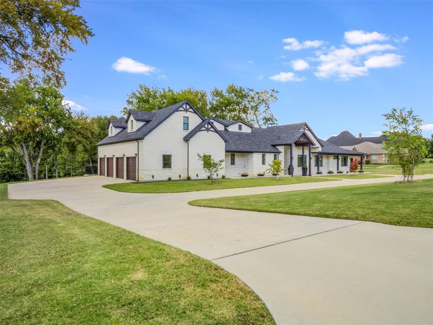 Set on a peaceful one-acre lot in Willow Brook Park Estates, this thoughtfully designed custom home blends sophistication with everyday comfort. A circle drive with separate parking for the in-law suite, mature trees, and no rear neighbors enhance privacy, while irrigated flowerpots and natural landscaping create a serene retreat. Inside, the flexible layout highlights quality finishes throughout. A private in-law suite (or casita) with its own entrance includes a living room, kitchen, bedroom, bath, laundry, 32-inch doorways, and a roll-in shower, ideal for guests or multigenerational living. The main residence features cathedral ceilings, luxury vinyl plank flooring, granite surfaces, barn doors, and crown molding. The kitchen showcases custom cabinetry, quartz countertops, farm sink, champagne fixtures, dual pantries, and an auto-sensing vent hood, all opening to a living area with vaulted beam ceilings and a glass rock tile fireplace. A dedicated office with french-doors adds flexible workspace. The primary suite offers a walk-in closet, built-in vanity, and oversized shower, while two bedrooms share a Jack-and-Jill bath. Upstairs, a game room with full bath, closet, and plumbing for a mini bar or kitchenette expands living space. An unfinished bonus room is perfect as a hobby room or teen retreat, while the third-floor observation deck delivers sweeping country views. Outdoor living includes a covered patio with built-in grill and ceiling fan, plus a tiered backyard framed by a retaining wall, ready for a pool. Car enthusiasts will love the oversized four-car garage with epoxy floors, 9-foot doors, built-ins, HVAC, and 220v power. Additional upgrades include two tankless water heaters, three HVAC units with five zones, soundproofing, exterior foam insulation, enhanced electrical and lighting, Christmas lighting switch, 16 LED up lights, sprinkler system front and back, and RJ45 direct-connect from the office to the telescope deck. A truly exceptional property!