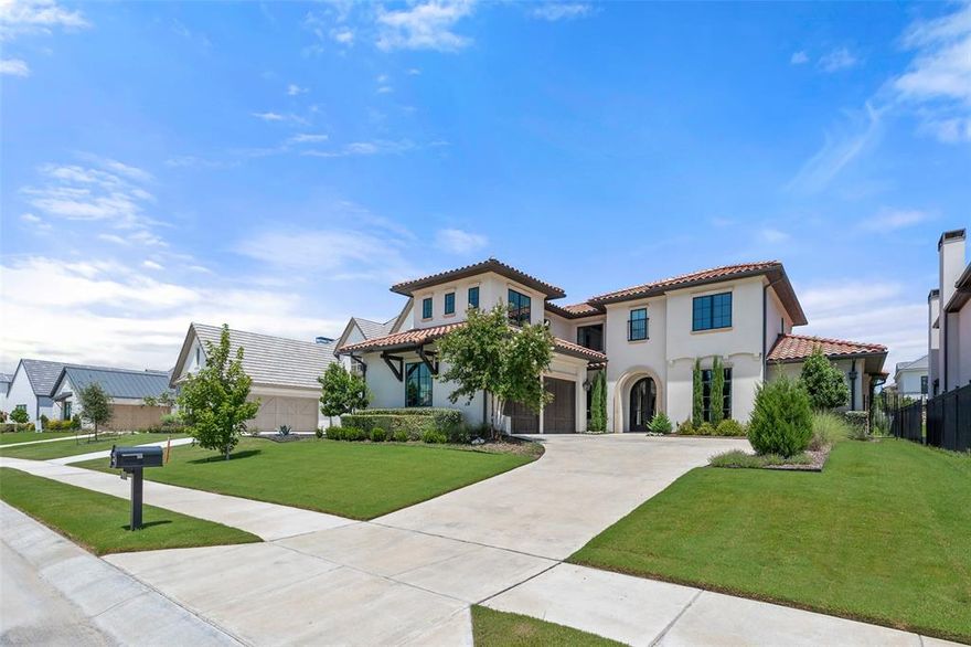 Nestled in the exclusive, 24-hour guarded Montrachet community, this exquisite home perfectly combines timeless elegance with modern luxury and functionality. The prestigious neighborhood features over 50 acres of scenic green space with hiking and biking trails, community pool, amenity center, putting green, pickleball courts and an outdoor pavilion in the pecan orchard. This meticulously designed home exudes a lifestyle of luxury & comfort, offering an array of high-end features and finishes. The thoughtfully designed floor plan includes five spacious bedrooms all with ensuite luxury bathrooms and large walk-in closet with two located on the first floor. A beautifully appointed entryway leads to French doors opening to the versatile front study that could also be perfect for a formal dining or a sitting room. The expansive open-concept kitchen flows seamlessly into the grand living room, distinguished by a dramatic 16-foot sliding glass door that opens to a covered outdoor living area. The backyard is beautifully landscaped with room for a pool. The kitchen is a chef's dream with an oversized island, gourmet appliances and connects to the adjacent dining area. The owner's suite on the main level includes a relaxing sitting area that offers a serene view of the backyard. The spa inspired primary bath features a freestanding tub, separate shower, expansive cabinetry, and a custom designed walk-in-closet. Upstairs there is a large entertainment space, featuring seating and game table spaces along with three additional bedrooms. Abundance of storage throughout.