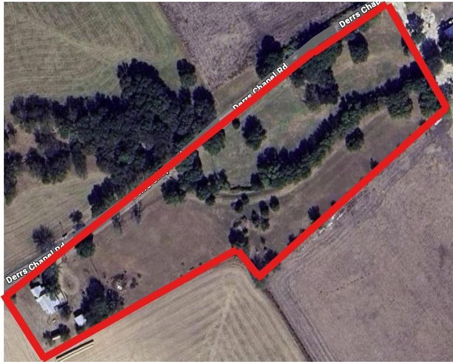 Home is being sold AS IS. This property sits on 6.15 Acres and has over 1000 feet of road frontage. With a nice creek on the northside of the property, this has great potential to be a great homesite. While the home does need some TLC, there are some extras around the property as well, such as a workshop, chicken coop, and extended wooden patio. This is a great opportunity to have some acreage and build your dream home on.