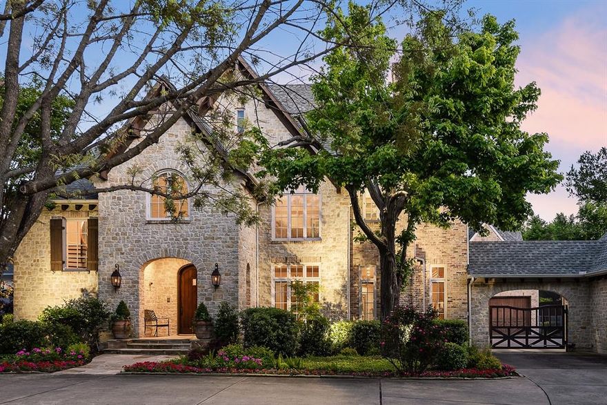 Beautiful storybook Tudor on Norway. Living room with 12’ ceilings. Wet bar. Large wine room. Spacious dining room. Wonderful flow for entertaining. Gourmet kitchen with island & window overlooking motor court. Keeping room with charming fireplace could be breakfast room or furnished with comfy chairs for morning coffee. Downstairs primary suite includes remodeled bath, large closet, private study & bonus room for exercise, nursery, etc. Upstairs has 4 ensuite bedrooms, large craft closet, study space with 3 desks, & gameroom with ample light. Go up 3 steps into incredible 450 sqft storage deck. Outside relax by the pool with spa, practice your putting on the green, and still enjoy ample grassy space.