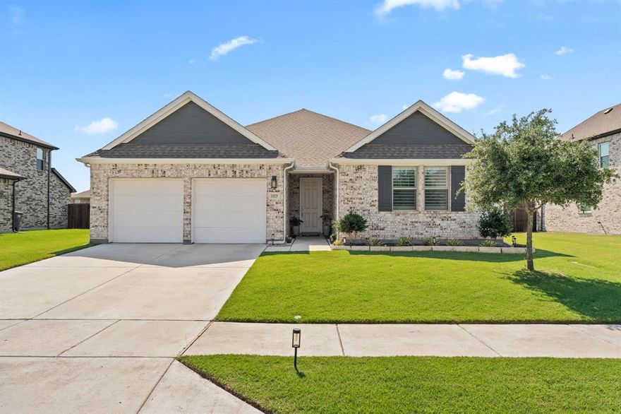 Beautifully maintained Ashton Woods home on an oversized lot offering extra privacy between neighbors and an extended driveway. This inviting open-concept floor plan was designed for both everyday living and entertaining, with warm natural light and spacious living areas throughout. The kitchen opens seamlessly to the dining and living spaces and features quartz countertops, stainless steel appliances, ample cabinet space, and a large island perfect for gathering with family and friends. The split-bedroom layout provides flexibility and comfort, while the covered back patio overlooks a fully fenced backyard with room to relax and unwind. Located in a peaceful community with nearby ponds for walking and fishing, plus a splash pad and playground just down the street. Convenient access to I-35W and Hwy 287 makes commuting to Fort Worth and surrounding areas easy.