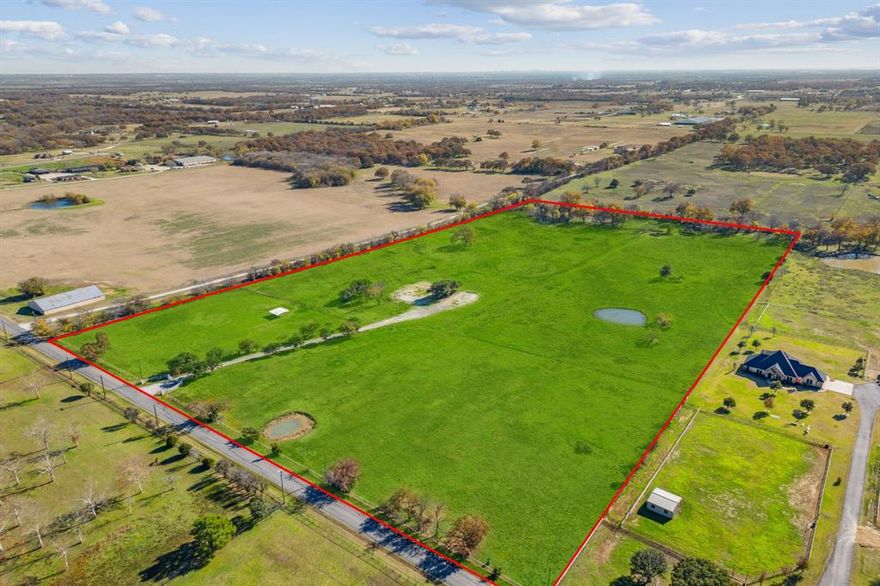 Nestled in the picturesque town of Pilot Point, Texas, this expansive 27-acre vacant estate lot awaits the realization of a dream home. Surrounded by the natural beauty of the Lone Star State, this property offers a perfect canvas for creating a private estate.  The lot is strategically positioned to take advantage of panoramic views of the surrounding countryside.  Whether you envision a ranch-style estate, a modern masterpiece, or a classic southern home, this 27-acre canvas in Pilot Point, TX, promises to be the foundation for a beautiful dream home