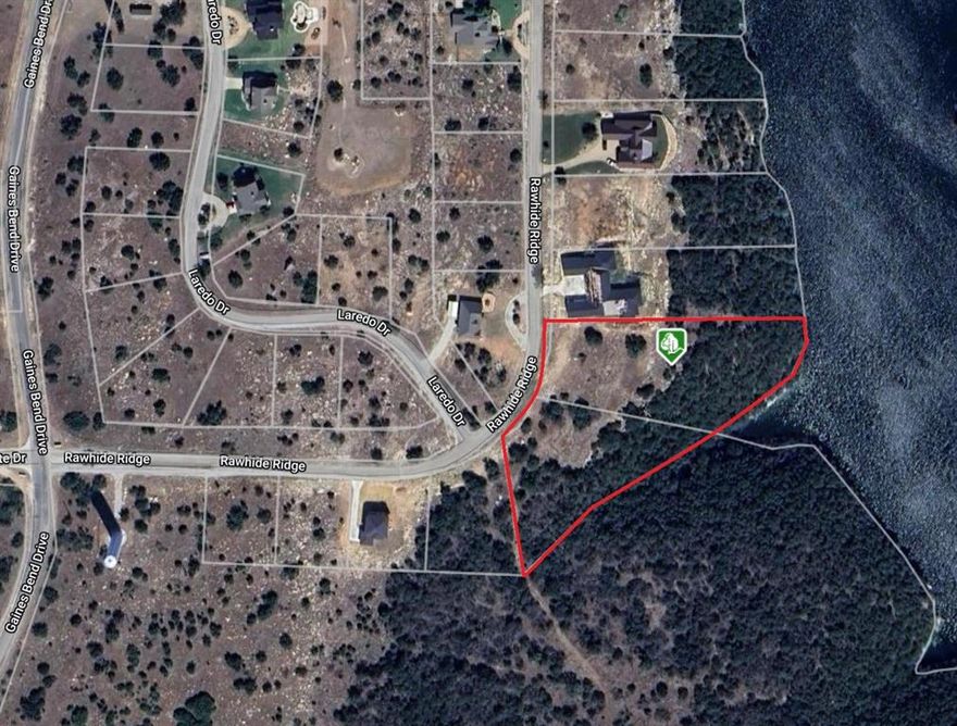 STUNNING LAKE FRONT VIEWS OF POSSUM KINGDOM! Welcome to the beautiful community of Gaines Bend on Possum Kingdom Lake! This gorgeous lake front lot boasts over 2 acres of prime real estate and it includes lot 26 and 27, which offers plenty of space for you to build your dream home. Imagine waking up to breathtaking views of the sparkling water and surrounding natural beauty with wildlife everywhere! This incredible neighborhood is ideal for those seeking a peaceful retreat with plenty of recreational activities at your doorstep. With ample space to build your dream home, you can design a custom retreat that perfectly compliments the stunning landscape. Gaines Bend has a gated entrance & offers direct lake access from its nearby community boat ramp & marina, as well as courtesy docks & day slips. Enjoy boating, fishing, swimming and water sports right in your own backyard! Whether you are looking for a weekend getaway or a year-round residence, this lake front property offers the perfect opportunity to create a luxurious oasis. Don't miss your chance to own a piece of paradise on the beautiful Possum Kingdom Lake!