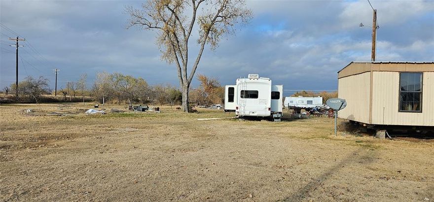 Prime development opportunity located in an ETJ directly along US Highway 380 in Decatur, Texas, one of North Texas’ fastest-growing corridors. This 2-acre parcel offers exceptional visibility, strong traffic exposure, and flexible future potential as Highway 380 continues to expand and densify. The land has a well thats over 100 feet and a septic system that has drainage plus a clean out. The property is a great land-value play for investors, developers, or owner-users seeking to reposition or redevelop the site. The existing mobile homes may be removed or  provide interim use or holding income while future plans are finalized. Surrounded by a mix of commercial, industrial, and service-oriented uses, the site is well-suited for a variety of potential uses, including retail, office, contractor yard, storage, service commercial, or future mixed-use, subject to zoning and city approvals. At the buyer's request, all the trash and mobile homes can be removed.