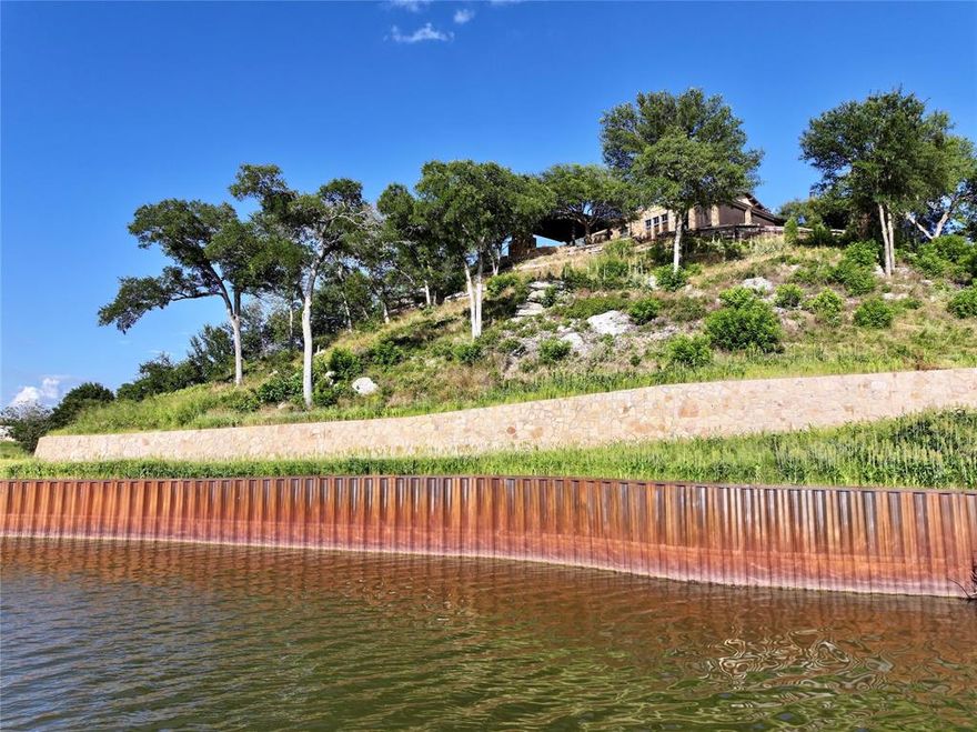 RIVERFRONT MASTERPIECE!! This custom built home is a mix of Mediterranean and ranch styles perched high above the Brazos River. The property is complete gated entrance, walking trails, brand new boat dock, unparalleled elevated views and much more.