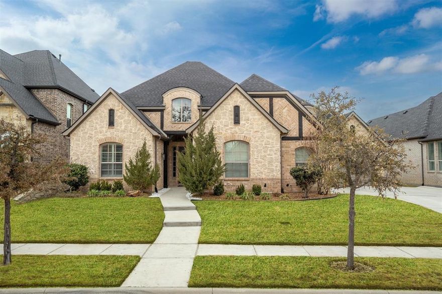 Timeless single-story custom home in the boutique gated community of The Oaks of Argyle, offering the perfect blend of small-town charm and modern living just minutes from dining, shopping and major commuter routes. Ideally located in highly desirable Argyle ISD and within walking distance to Argyle Middle School - soon to be a new high school in 2027 - this home appeals to families seeking both convenience and quality education.  Step inside to an open, light-filled layout with plantation shutters, beautiful wood floors, and custom finishes throughout. The heart of the home features a spacious living area that flows seamlessly into the kitchen - perfect for everyday living and entertaining. A dedicated home study provides an ideal work-from-home space, and one of the four bedrooms is versatile enough to serve as a game room or additional gathering space. Premium touches include granite countertops, custom cabinetry, and a large walk-in shower in the primary suite. Outdoor living is equally impressive with a private backyard and outdoor fireplace, creating an inviting atmosphere for relaxing evenings. The neighborhood itself offers the added appeal of a gated entry for privacy and peace of mind, and will soon connect to the new Argyle Nature Trail, ideal for outdoor enthusiasts. Even better, residents will enjoy convenient walkability to nearby shops and dining, including the upcoming Argyle Market Place, bringing everyday amenities just steps from home.