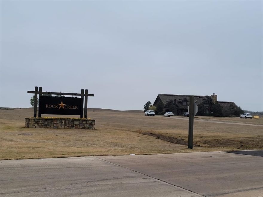 This quiet and private lot is located in Rock Creek Resort, a gated community about an hour from Dallas. The neighborhood offers useful amenities such as a Jack Nicklaus–designed golf course, clubhouse, marina, swimming pool, fitness center, and walking trails.The lot has mature trees and provides a calm setting for building your future home. With plenty of space and great community features, this is a good place to start planning your next move.