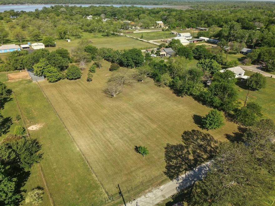 If you are looking for a beautiful lot with mature tress to build your homestead, don't miss this unique lot in South Wise county with no city taxes.  County Road 4880 is a hidden gem in Newark Beach Estates with deeded lake access is just minutes away.  NWISD schools.  The 1.72 acre lot has beautiful mature trees. The lot already has an aerobic septic and electric. Road access from the front and back of the lot. Only 10 minutes to Haslets growing city with shopping and restaurants. Easy access to 114 and 287.