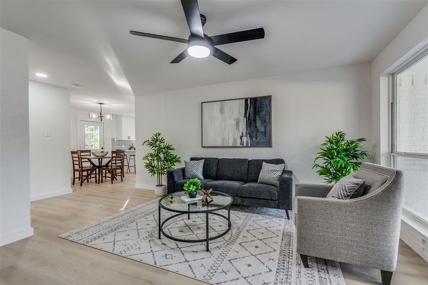 WELCOME HOME! Move in ready single story and ZHS impeccably renovated. Rare 4 bedroom, 3 full bath. Tons of
designer touches and trending designs. This home boast beautiful white oak colored
luxurious vinyl plank floors & stunning white painted walls. Completely new kitchen with shaker style soft close
cabinets, gorgeous Quartz counter tops, and subway tile backsplash. Entertaining is a breeze in this large kitchen and dining area. Home boast 2 primary bedrooms with en suite bathrooms. The new main primary has a large en suite
bathroom complete with dual vanity, walk in shower and generous closet!  At the end of the day escape to your spacious, private back yard. Too many updates to list them all. MUST SEE!!