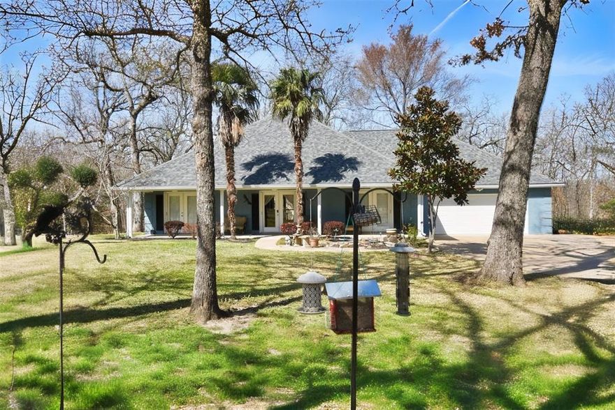 Here is a FABULOUS waterfront home on Legendary Lake Fork! This brick home also has a guest house, all sitting on 1.85deeded acres on Lake Fork Waterfront with Leaseback. Here you have your own private boat ramp, a covered boat housewith boat lift and an open deck for sunning or fishing off your own pier. Home features 3 bedrooms, 2 bathrooms, ceramictile and hardwood flooring thourghout the home, a central vacuum system, bricked wood burning fireplace, 10 x 13 office, breakfast dining room in the kitchen and the formal dining room can be used as a sitting area, 12 x 16 storage shed, 2 carattached garage is 24 x 22 and a two stall detached garage is 29 x 30 big enough for your bass boat and room for all yourtoys, plus a half bath. Main home has an 8 x 49 covered front porch and a 8 x 20 covered back porch plus a 21 x 21 openpatio area. Guest house above detached garage has an open floorplan concept with outdoor deck seating space and will beperfect for friends, extended family or use as a daily rental for fisherman. This is one of those rare finds on World FamousLake Fork! Bring your best offer before it is too late! Furnishings are negotiable. Buyer to verify any and all information.