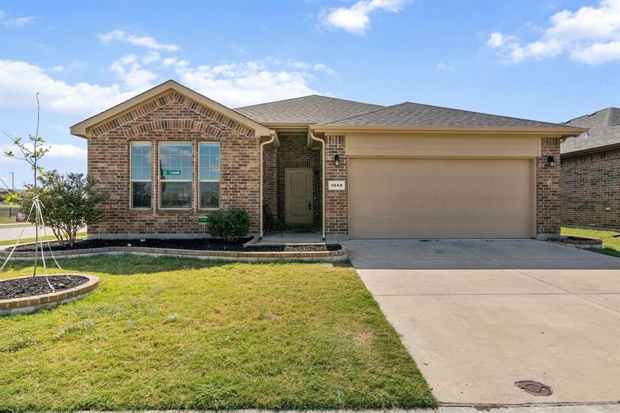 Beautiful 4-bedroom, 2-bath home situated on a premium corner lot in the desirable Revelstoke community of North Fort Worth! Built in 2019, this home offers an open-concept floor plan. The spacious kitchen features a large island, a gas cooktop, granite countertops, stainless steel appliances, and plenty of cabinet storage. The light and bright living room is perfect for entertaining, with views overlooking the peaceful greenbelt and pond behind the home. The primary suite is privately located at the rear of the home and includes dual sinks, a soaking tub, a separate shower, and a generous walk-in closet. Three secondary bedrooms share a full bath near the front of the home, creating a convenient split-bedroom layout. Enjoy outdoor living under the covered patio and take in the tranquil backdrop with no rear neighbors. Conveniently located near Alliance Town Center, major highways, shopping, and dining. Don’t miss this charming home that perfectly combines comfort, style, and location!
