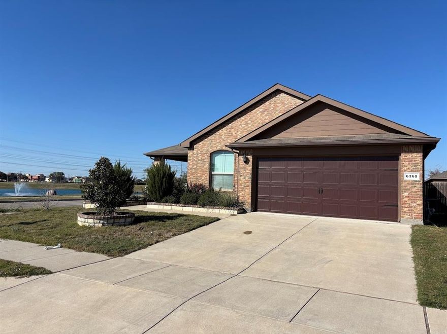 Welcome to 6360 Porthole Ln, a beautifully maintained 4-bedroom, 2-bath single-story home located in the highly rated Eagle Mountain-Saginaw ISD. Built in 2018, this modern home features a bright, open-concept layout perfect for families, professionals, or anyone seeking comfort and convenience.

The kitchen is the centerpiece of the home, offering granite countertops, stainless steel appliances, an island with seating, a walk-in pantry, and upgraded cabinetry. The spacious family room boasts vaulted ceilings and plenty of natural light, creating an inviting space for everyday living and entertaining.

The primary suite is thoughtfully separated for privacy and includes dual sinks, a separate shower, a soaking tub, and a large walk-in closet. Secondary bedrooms are split from the primary and generously sized—ideal for family, guests, or a home office.

Step outside to a covered patio overlooking a private backyard with no rear neighbors, perfect for outdoor dining or relaxation. The home sits just steps from the community pond, walking trails, and open green space—offering a peaceful, scenic setting.

Neighborhood amenities include a community pool, playground, clubhouse, and walk paths. Conveniently located minutes from Kroger Marketplace, Walmart, Starbucks, shopping, dining, and Eagle Mountain Lake. Easy access to Loop 820 and Hwy 287 makes commuting simple. Zoned for Boswell High School.

Schedule your tour today—this move-in ready home has it all!