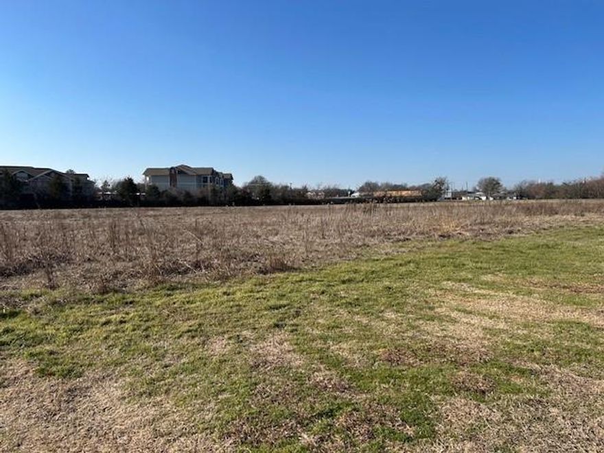 3.0 ACRES JUST SOUTH OF THE LAKEWOOD TERRACE APTS.  JUST OFF OF SPUR 316 WEST END OF POTTSBORO,  ACROSS FROM GOINS LUMBER.