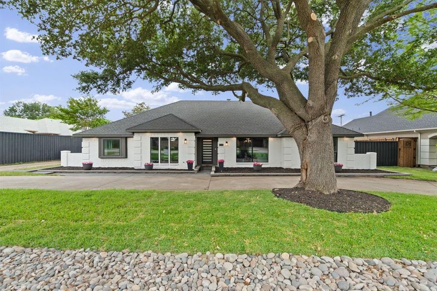Fully renovated 4-bedroom, 3-bathroom single-story traditional in the Preston Road Highlands subdivision in Dallas, Texas 75252. This 2,709-square-foot home on a 0.34-acre lot was thoughtfully expanded and remodeled with designer finishes throughout. The open-concept kitchen features an oversized quartz island with dual sinks, KitchenAid appliances including a convection oven and electric cooktop, a wine cooler, breakfast bar, and walk-in pantry. Luxury vinyl plank flooring runs throughout the main living areas, anchored by a marble-clad fireplace in the living room. A built-in wet bar connects entertaining spaces. The formal dining room and dedicated home office flank the entry. The utility room includes a utility sink and built-in storage. The primary suite includes dual sinks, quartz vanity tops, a floor-to-ceiling marble walk-in shower, a second marble-clad fireplace, dual walk-in closets with custom cabinetry, and an en suite bathroom with Delta fixtures. Three additional bedrooms share two full bathrooms finished in designer tile with quartz vanity tops. Outside, a circular driveway leads to a 2-car attached garage with RV or additional parking access. The private backyard features a freshly re-plastered, re-tiled gunite pool, wood privacy fence, in-ground sprinkler system, and covered front porch. New 2025 energy-efficient windows throughout. Brick and board-and-batten exterior with fresh exterior paint. No HOA. Preston Road Highlands is located minutes from Preston Road dining and retail, the Shops at Willow Bend in Plano, and the Dallas North Tollway. Served by Plano ISD — Haggar Elementary, Frankford Middle School, and Shepton High School. Dallas, TX 75252.