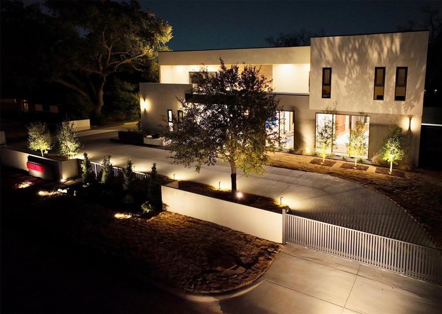 NEW construction, complete 2025! Next-level luxury and innovation in this steel-frame contemporary masterpiece, ideally located in the prestigious private school corridor. Designed for modern living, this home features 5 spacious bedrooms and a versatile first-floor secondary bedroom. With 6.5 designer bathrooms and a dedicated office overlooking the manicured front yard, every detail is crafted for comfort and style. The home’s sophisticated layout includes three distinct living areas on the second floor and two on the first, offering abundant space for relaxing, entertaining, or multi-generational living. The open-concept kitchen is a culinary dream, outfitted with premium Sub-Zero and Wolf appliances, custom cabinetry, and elegant stone finishes. A separate prep kitchen and built-in coffee station add convenience and flair, making this space perfect for both daily living and upscale entertaining. Step outside to a low-maintenance turf backyard complete with a stylish lounge area and built-in grill. Additional highlights include a circular drive way, 3-car garage, a finished balcony with multiple sitting areas, soaring ceilings, and custom millwork throughout. Listing agent is related to the seller.