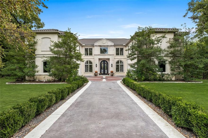 This 6467 Sq Ft home sits on a tree lined 1.1-acre lot within this exclusive neighborhood offering a seamless blend of luxury and convenience. This property is nestled by a creek and park, just moments from Dallas's best amenities, with quick access to the Tollway and 635. The exterior boasts timeless stone architecture and breathtaking drive up appeal while inside, the open floor plan features dual staircases, vaulted ceilings, and marble flooring. The gourmet kitchen includes high-end SS appliances and a large center island. All 4 bedrooms boast private en suites, with the primary suite spanning 1000 Sq Ft, featuring his and hers separate bathrooms and closets. The backyard oasis includes a covered patio, pool, and custom-built cabana. Additional highlights include a stunning theater with 150 inch screen, home office or 5th bedroom, private gym, custom den, and a four car garage. Elegant design, modern amenities, and a prime location make 14918 Lake Forest Dr an exceptional showcase.