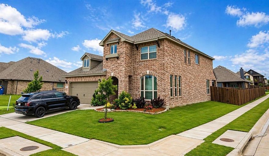 Welcome to this beautifully designed two-story brick home perfectly situated on a desirable corner lot, offering both curb appeal and everyday functionality. From the moment you arrive, you’re greeted with manicured landscaping, a welcoming façade, and a layout that truly feels like home.

Step inside to a bright and inviting foyer that flows seamlessly into a versatile dining room or optional study—perfect for entertaining guests or working from home in style. The open-concept design leads you into a spacious family room, filled with natural light and ideal for gatherings of any size.

The heart of the home is the chef-inspired kitchen, featuring a large island, ample counter space, and a cozy breakfast area—perfect for morning coffee or casual meals. Just off the kitchen, you’ll find convenient access to the laundry room and a well-placed powder bath for guests.

The private primary suite (Bedroom 1) is thoughtfully tucked away on the main floor, offering a peaceful retreat with a spa-like en-suite bath and a generous walk-in closet.

Verify schools...