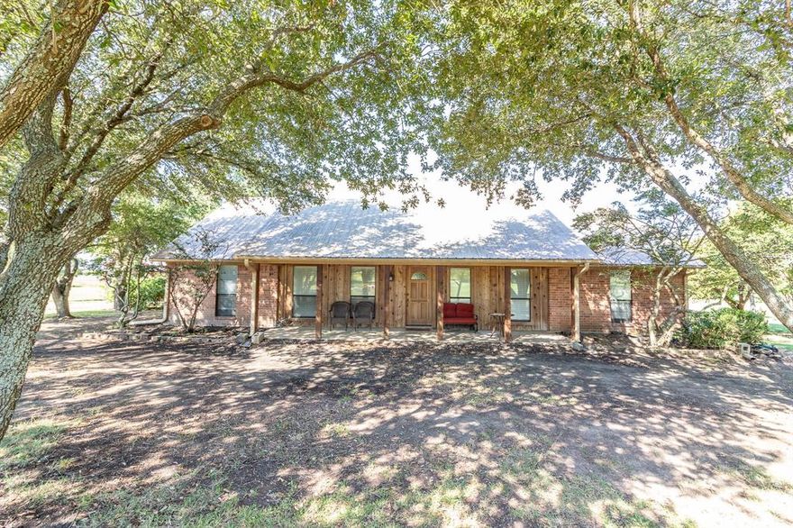 Discover the perfect blend of space, privacy, and Texas charm in this must-see 3-bedroom, 2-bath home set on nearly 5 serene acres with a pond. Picture yourself watching breathtaking Texas sunsets from your patio beneath mature shade trees, then cooling off in your inviting in-ground pool on hot days. A rare find includes a 30 x 30 workshop with carport—ideal for RV or boat storage—and you’ll love the spacious interior featuring a large living area, two dining rooms, and a generous office space for work-from-home days. Enjoy the convenience of quick access to Highway 175 while savoring the privacy of a five-acre homestead tucked at the end of a quiet cul-de-sac, with no HOA to impose restrictions. Crandall ISD adds excellent school options, and a metal roof with a radiant barrier helps keep utilities and insurance costs down. Recent updates include new plumbing, electrical, foundation repair, and two HVAC units. This property isn’t just a home—it’s a lifestyle upgrade you’ve earned. Don’t miss your chance to own this standout oasis.