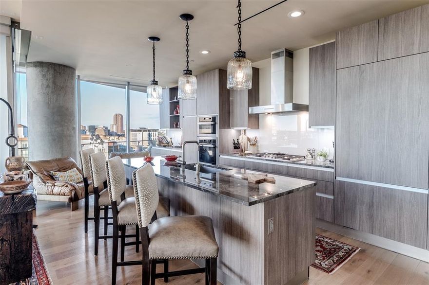 Meticulously maintained unit with incredible views in the highly sought after Bleu Ciel Hi-Rise. This 3 bed 3 bath condo features an open floor plan with floor to ceiling windows, hardwoods throughout, decorative lighting and custom closets. The kitchen features Miele appliances, Porcelanosa cabinets, Jan Barbolio pendant lights, and a Culligan purified faucet, providing a state of the art kitchen for any level of chef. The bedrooms feature electric black out shades, walk in closets and en-suite baths. This unit features a large 825 square foot wrap around balcony providing a great space for morning coffee or amazing sunsets in the evening. The building features unparalleled amenities such as two junior olympic size pools, a resident only spa, wine room, two executive board rooms, social room with library, private garages, fitness room with state of the art equipment, dog run, 24-7 concierge and valet, and direct access to the Katy Trail. This unit features a premium two car garage located on floor 1.