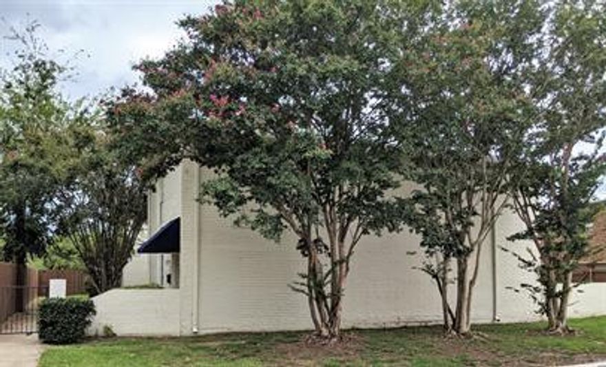 **SPECIAL OFFER - SEE PRIVATE REMARKS** Welcome home to this beautifully updated two-story townhome located just minutes from Walnut Hill, Marsh Lane, and major highways. With quick access to Love Field in just 10 minutes and DFW Airport in 20, you'll enjoy both convenience and comfort in one ideal location. The main level features stylish laminate flooring, while the upstairs offers cozy carpet throughout. The updated galley-style kitchen includes stainless steel appliances and a bright breakfast nook, perfect for morning coffee or casual meals. The open dining area includes extra storage and flows seamlessly into a spacious living room, where ceiling fans help keep the space cool and comfortable.
This home offers two primary bedrooms, one downstairs with direct access to the private patio and excellent closet space, and another upstairs with a dedicated vanity, walk-in closet, and shared Jack-and-Jill bathroom. The third bedroom also offers generous closet space, making this layout flexible for a variety of living needs, whether for a home office, shared living arrangement, or additional bedroom. A full bathroom is located downstairs, and washer dryer hookups are conveniently located upstairs. Water, sewer, and trash are included for a flat $50 monthly fee. Don't miss out on this well-maintained, centrally located townhome—schedule your showing today and see all it has to offer!