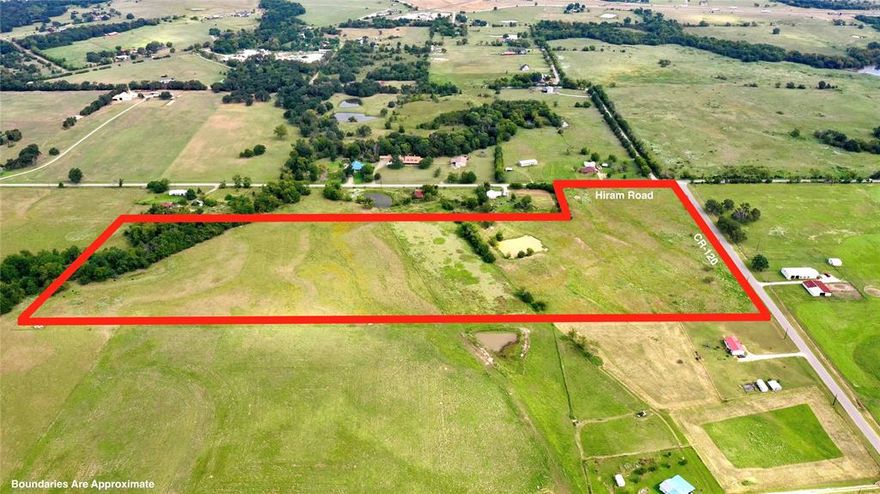 30 AG EXEMPT acres located just off I-20. The property has frontage on two paved county roads and is fully fenced with a pond. Ideal location for a future home site, residential development, or long-term investment.