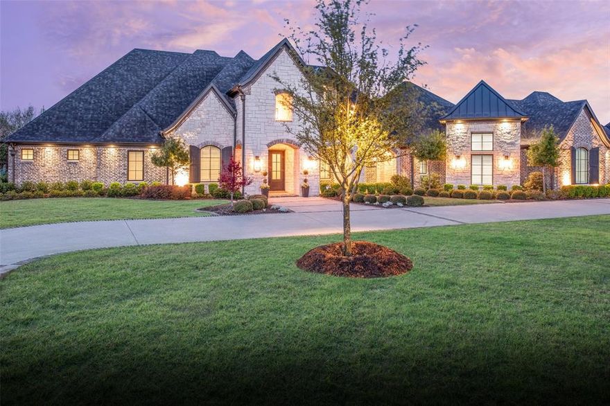 This stunning single story, custom built home is nestled on a premier creek lot offering an oasis of tranquility.  Built with the luxury owner in mind, the technology, security and equipment automation will be appreciated by any new owner.  If you work from home, the 2 private offices will likely be a welcome addition with plantation shutters and views of the front of the property.  Each of the 5 bedrooms features an ensuite bathroom with 2 additional half bathrooms for guest convenience.  The media room features stadium seating, a Sony 4k projector, 10 speakers, 2 sub woofers and 1 center channel with a Screen Innovation 5 series 120 in fixed screen.  The workout room at the back of the house includes rubber flooring and a full wall mirror. The chefs kitchen has Thermador appliances throughout that include a 48in pro range top, double ovens, built in microwave, built in fridge and freezer, and under cabinet wine fridge. With quartz countertops, a 48in Faber pro series vent hood and a reinforced pantry that doubles as a safe-tornado room, the luxury kitchen opens to the family room with views of the back patio.  The focal point of the family room might be the gorgeous chandelier, the 42in True Direct gas fireplace, or the wood beams across the ceiling.  Sliding doors provide access to the oversized back patio that can be screened in for additional time enjoying the outdoors. The patio features a fireplace, built in gas grill, sink and fridge as well as sonance sound system with sub woofers that connects to the control4 system.  Travertine floors provide access to multiple patio levels for entertainment at the pool, fire pit or even creek access.  Other features include Pella windows, 2 inch spray foam insulation on ceiling joists with R38 blown insulation, 2 Lennox high efficiency 16 seer dual zone system, automated window treatments, luma surveillance cameras, backup generator, hidden storage as well as a 22 x 15 foot storage room above the garage.