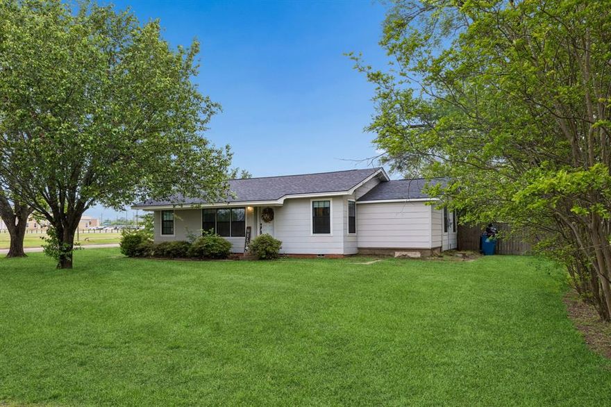 Located at 597 E Main Street, this well-positioned property offers a compelling blend of space, convenience, and connectivity, making it a strong option for buyers seeking value and functionality. Built in 1959 and offering approximately 1,984 square feet, this 3-bedroom, 2-bathroom home provides a versatile layout with generous living areas designed to support a variety of needs, including a bonus bedroom or dedicated office space ideal for remote work or creative pursuits. The expansive kitchen serves as the central hub of the home, featuring a large island, abundant cabinetry, and extensive storage options that enhance both daily living and entertaining potential. Multiple living spaces allow for flexibility in how the home is utilized, whether for relaxation, productivity, or hosting. Natural light enhances the interior, creating a comfortable and inviting atmosphere throughout the main living areas. The property sits on a large lot and includes a private, fenced backyard, creating a secure and usable outdoor environment with room for activities, gardening, or future enhancements. A nearby park and walking track further expand recreational opportunities just moments from the front door, supporting an active and convenient lifestyle.Connectivity is a standout feature, with access to high-speed fiber internet supporting modern digital demands, along with convenient proximity to I-20 for efficient commuting and travel. The home is uniquely positioned next to both an elementary and middle school, adding to the location’s overall accessibility and daily convenience. With its combination of square footage, lot size, flexible living options, and strategic location, this property presents a practical and appealing opportunity for buyers searching for space, connectivity, and ease of access in one cohesive offering.