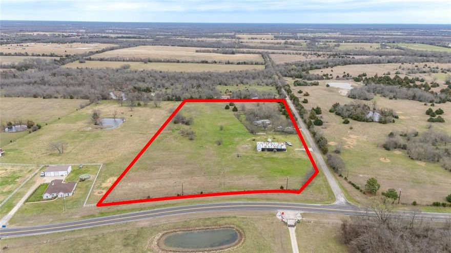 Bring your horses, your kids, and your dreams to this beautiful 10+ acre property in Lone Oak, Texas! Ideally located just 60 miles northeast of Dallas, this peaceful and private acreage offers the perfect blend of country living with convenient access to the Metroplex along with accessibility and room to grow.
Equestrian enthusiasts will appreciate the impressive 100’ x 48’ horse barn featuring four 12’ x 12’ stalls, two 12’ x 24’ mare and foal stalls, tack room, feed room, wash rack with washer and dryer hookups, horse walker, and electric hookup for an exercise wheel. The property is also fully fenced. An existing double-wide home is currently occupied and offers potential for renovation or the opportunity to build your dream home. The property includes two water meters, two electric meters, and an aerobic septic system. With road frontage on two sides, this tract also presents potential future development opportunities, bring your vision! (buyer to verify).
Quiet, scenic, and full of possibility — this is Texas country living at its best. Located within Lone Oak ISD (buyer to verify schools).
Horse walker to convey. Property includes a designated and tastefully maintained pet memorial area. (32 pets) Sellers will need up to a 30 day leaseback.