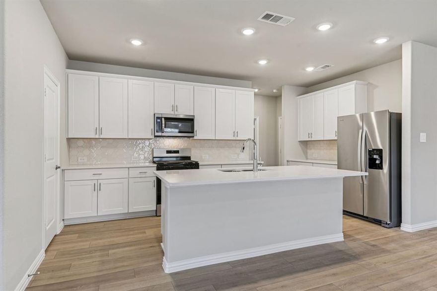 BRAND NEW energy - efficient home Jan 2026! The Beckley's front flex space and living room with volume ceiling make a striking impression. White cabinets with veined white quartz countertops, tan tone EVP flooring and light grey brown textured carpet.  Lakehaven is a master-planned community located at the edge of Lavon Lake, featuring all of the modern amenities. Family time will turn into lake time during the warm Texas summers. The Spring Series will boast six floorplans from our National Park Collection that range in size from approximately 1,270 sq. ft. to 2,255 sq. ft. Each of our homes is built with innovative, energy-efficient features designed to help you enjoy more savings, better health, real comfort and peace of mind.