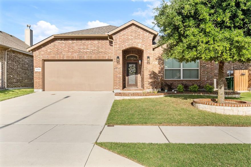 Welcome to 11312 Gold Canyon Dr in Haslet — a home that feels warm, comfortable, and easy to picture yourself in from the moment you arrive. With natural light throughout and a layout that just makes sense, this home gives you the perfect mix of cozy and functional living.
The kitchen opens directly into the main living area, creating a space that keeps everyone connected whether you’re hosting friends, enjoying family time, or having a quiet night at home. The primary suite offers a peaceful place to recharge, while the additional bedrooms give flexibility for guests, kids, or a home office setup.
Out back, the patio space is ready for weekend cookouts, relaxing evenings, or your morning coffee before the day gets started. The sprinkler system also helps make keeping up with the yard simple and convenient.
One of the best parts of this location is having easy access to shopping, restaurants, grocery stores, and major highways while still getting the neighborhood feel that makes Haslet so desirable. You’re also close to local favorites around Alliance Town Center with plenty of dining, entertainment, and retail options nearby. Parks, walking trails, and community spaces throughout the area make it easy to enjoy both convenience and everyday life close to home.
This home gives you the balance of comfort, convenience, and community — making it easy to settle in and feel right at home.