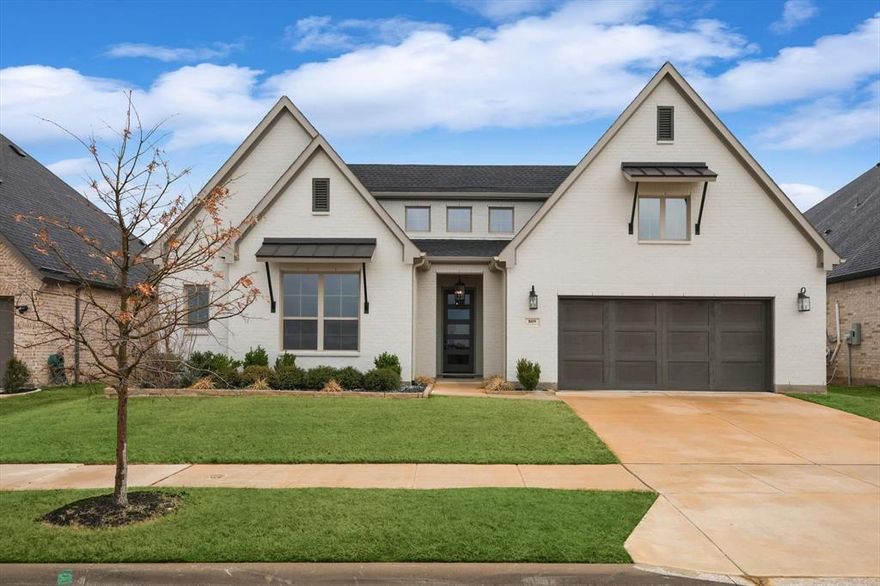 Welcome to your meticulously maintained modern traditional masterpiece, crafted by Toll Brothers and nestled in the heart of North Texas. From the moment you step through the door, you'll be captivated by the exquisite design choices and thoughtful storage solutions that define every corner of this home.

As you enter the remarkably sized entry hall, tall ceilings and elegant lighting greet you, inviting you to explore further. With an open floorplan that seamlessly blends spaciousness with intimacy, this home offers both connectivity and privacy, with designated spaces for work and relaxation alike.

The kitchen is a chef's delight, boasting stunning quartz countertops, a generously sized island with seating for four, and a pantry that's as beautiful as it is functional, ready to fulfill your organizational dreams. Decorative tile accents add a touch of sophistication, drawing the eye upward to the soaring ceilings above.