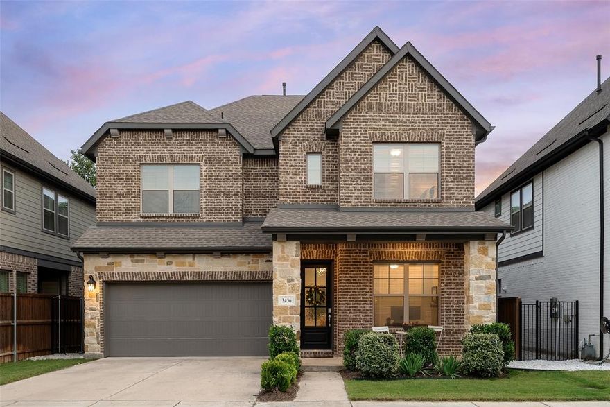 Tucked inside the quiet, manicured streets of The Reserve at Northaven — complete with a private dog park and beautifully kept entry — this like new home offers refined finishes, flexible spaces, and a large landscaped backyard. A covered front porch with a glass door sets a welcoming tone from the moment you arrive. Step inside and the thoughtful layout unfolds naturally — a handsome study framed by glass French doors, an open family room bathed in natural light from a wall of windows, and a dining space that flows seamlessly into the heart of the home. That heart is the island kitchen with crisp quartz countertops, Moen fixtures, a walk-in pantry, and a full suite of GE appliances — including a 36-inch five-burner gas range — make this a space equally suited to weeknight dinners and weekend entertaining. Counter seating at the island offers a space for breakfast, working or entertaining friends. Upstairs, the primary suite: overlooking the backyard, features a walk-in closet and a spa bath dressed in marble, anchored by an oversized walk-in shower. Three additional bedrooms — each with large closets — share two well-appointed full baths, while a spacious loft offers endless flexibility as a den, home gym, or second living area. A utility room with built-in cabinetry keeps the practical side of life organized and out of sight. Outside, a covered rear patio extends your living space into the large, fully landscaped backyard — a mature Magnolia tree and a wood privacy fence complete the picture. It's the kind of outdoor space that quietly becomes your favorite room in the house. With a Trane zoned 17 SEER HVAC system, Rheem tankless water heater, and composition roof (all 2021), the big-ticket items are already taken care of. Custom window coverings, engineered laminate wood floors, and a brick-and-stone exterior round out a home that is move-in ready.  Conveniently located minutes from the DNT, I35, 635 and the shops at Midway and NW Highway.