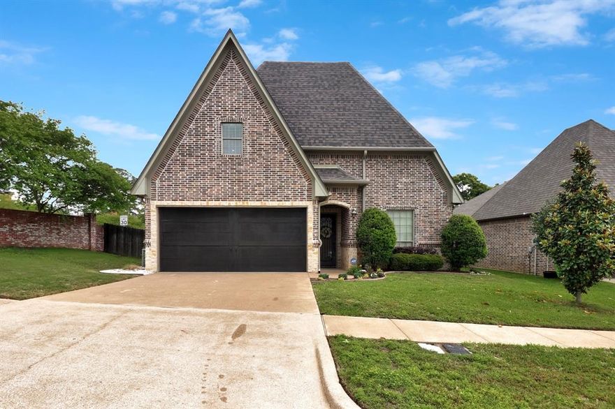 Nestled in the desirable Bishops Gate subdivision of South Tyler, this wonderful cottage-style home offers charm, comfort, and all the amenities you’re looking for. From the moment you step through the front door, you’ll feel the cozy, welcoming atmosphere that makes this house truly feel like home. A spacious entryway greets you and leads to two comfortable bedrooms with a shared bath, perfectly situated for family or guests. The lovely formal dining room provides an elegant space for gatherings and also offers convenient access to the backyard. The warm and inviting kitchen features beautiful granite countertops and generous workspace—perfect for cooking, entertaining, and displaying all your favorite kitchen pieces. The kitchen opens seamlessly into the bright living room, where a wood-burning fireplace creates a cozy focal point and large windows bring in plenty of natural light. Enjoy easy indoor-outdoor living with an additional patio entrance just off the dining area and kitchen—ideal for morning coffee or evening relaxation. The private primary suite offers a peaceful retreat with a spacious bath that includes a garden tub and separate shower. Flooring throughout the home includes carpet in the bedrooms, rich wood flooring in the living room, and tile in the kitchen and baths. Upstairs, a versatile bonus space, provides plenty of room for a game room, study, office, or media room—tailored to fit your lifestyle. Practical features include a convenient mud bench just off the utility room with garage access. Outside, you’ll find a spacious backyard ready for entertaining, gardening, or simply enjoying the outdoors. Located as the first home on the left as s you enter the subdivision, the home offers easy access within the neighborhood. 7212 Princedale. Additional features include a sprinkler system, security system, and according to the estate’s executor, the roof was replaced last year. Come home to happy in Bishops Gate.